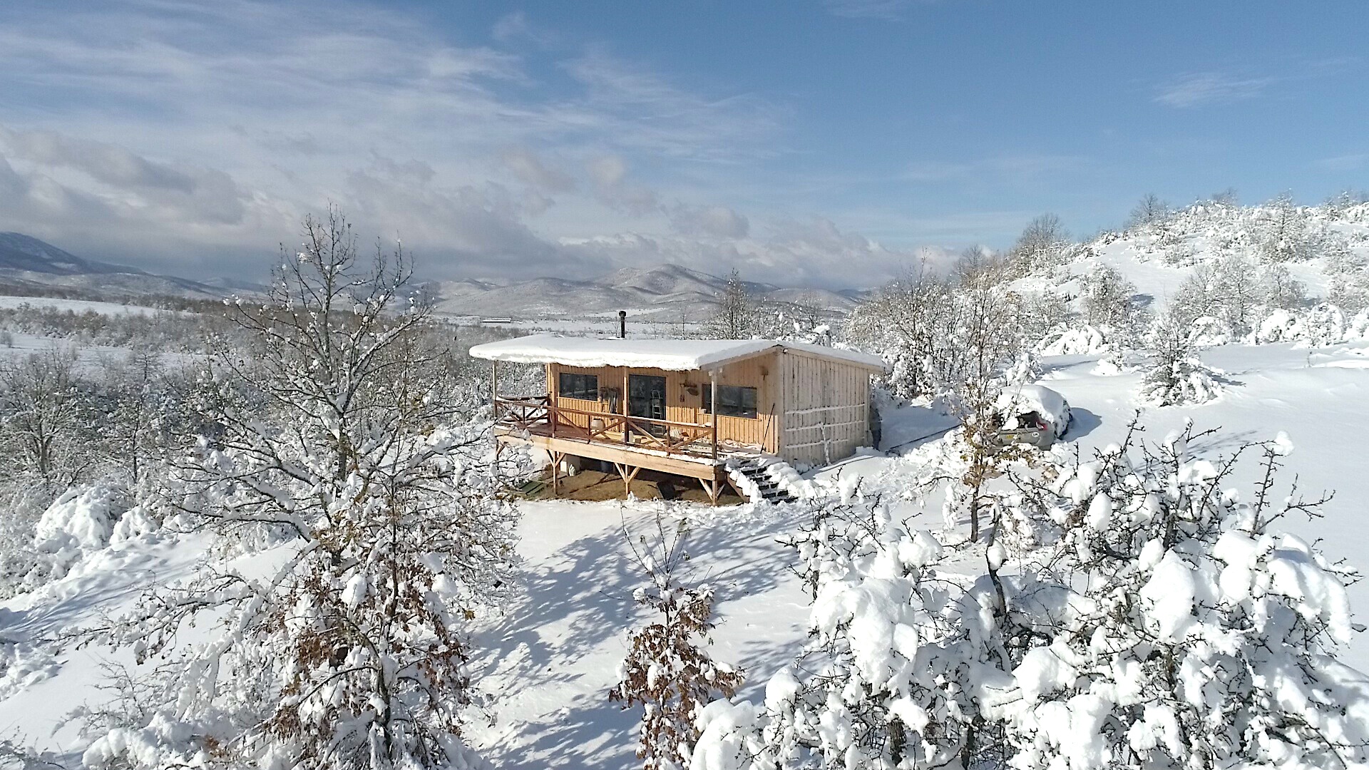 The Cabin on the Hill in the snow